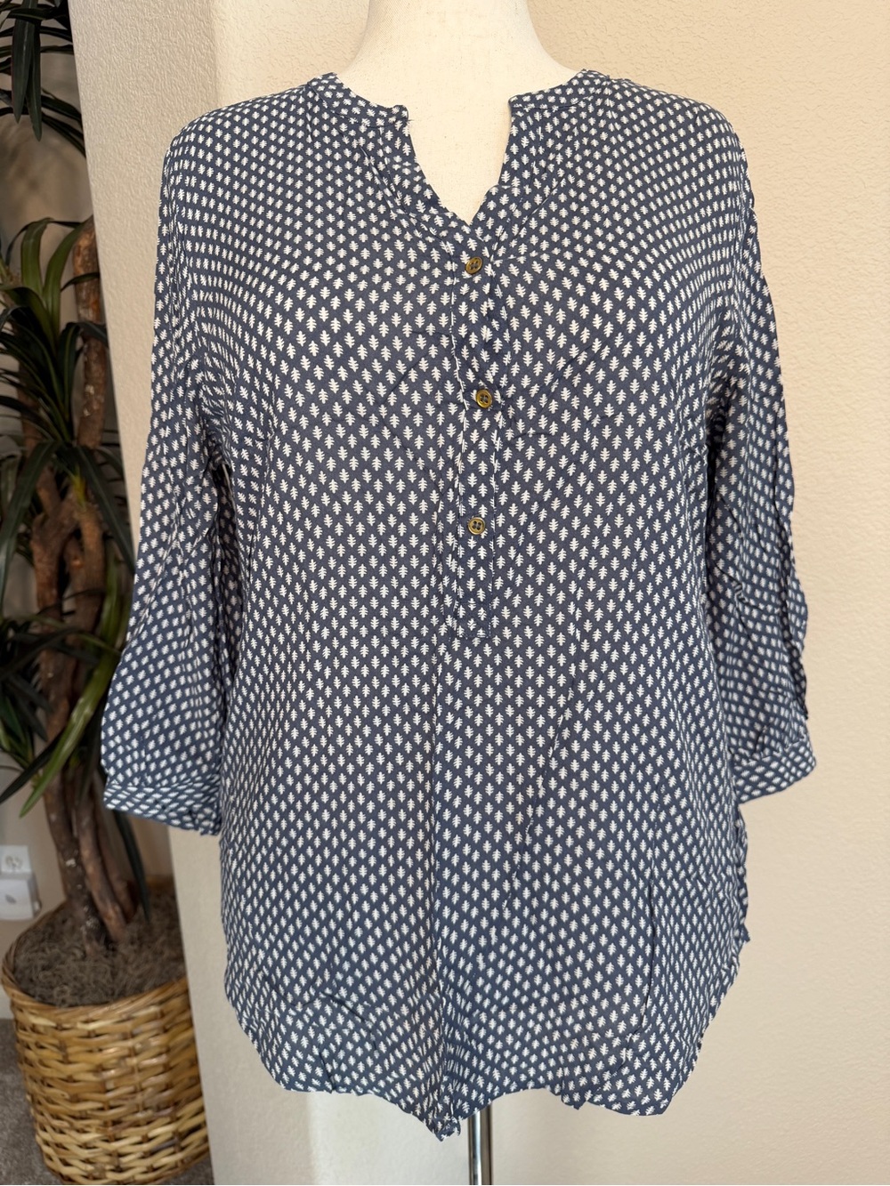 Steel blue tunic with an allover white geometric print